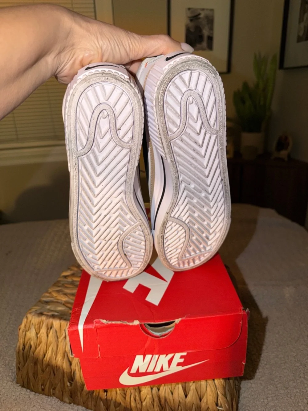 Nike White Low-Top Sneakers with Black Swoosh and Tan Stripe